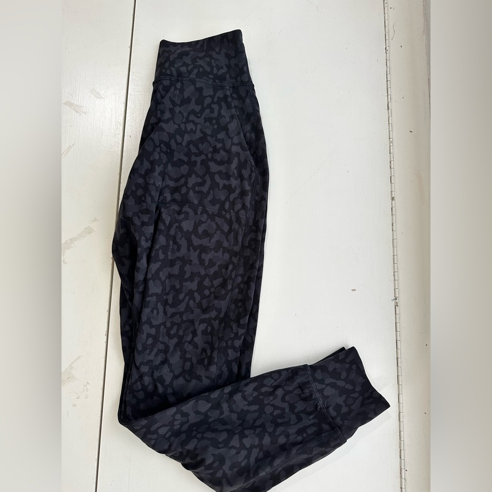 Lululemon black camo align joggers, lightly worn. Perfect condition.
